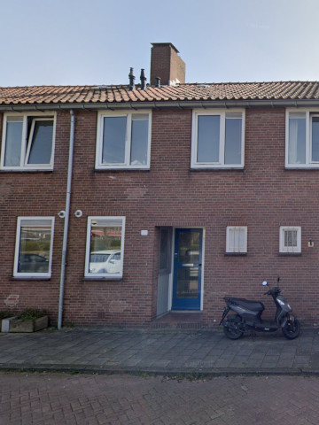 Slide het tweede woonhuis in Amsterdam van mijn vrouw.